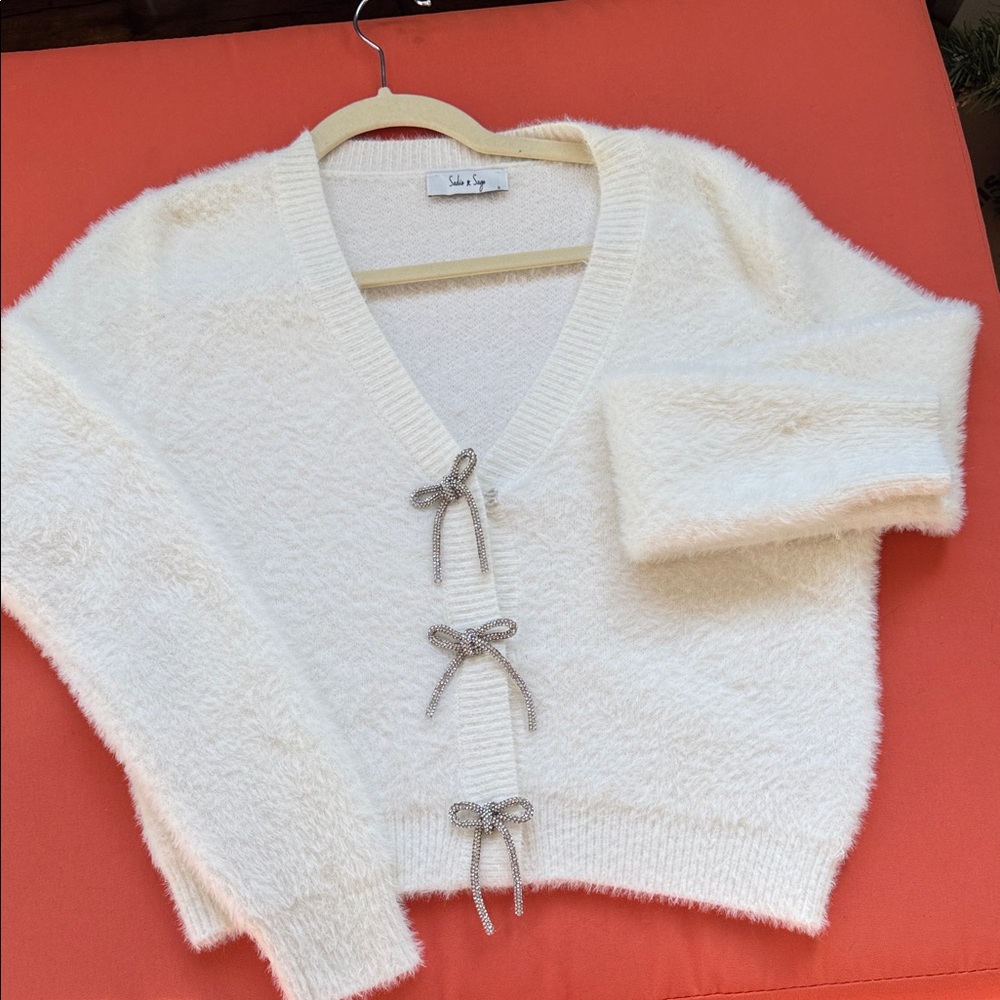 Sadie & Sage Cream V-Neck Sweater with Bow Details
